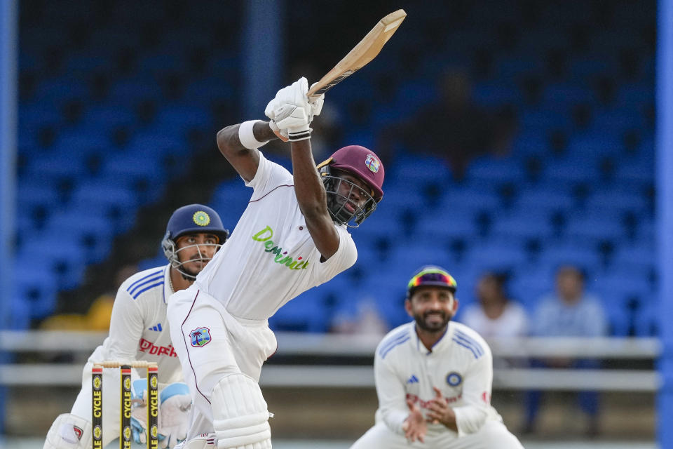 West Indies' Kirk McKenzie plays a shot for six runs form a delivery of India's Ravichandran Ashwin on day two of their second cricket Test match at Queen's Park in Port of Spain, Trinidad and Tobago, Friday, July 21, 2023. (AP Photo/Ricardo Mazalan)