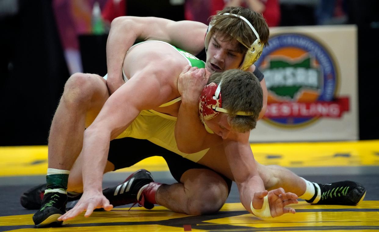 Pleasant senior Daxton Chase wrestles Barnesville senior Reese Stephen in the 150-pound Division III state championship bout this year at Ohio State's Schottenstein Center. Chase was named Fahey Bank Athlete of the Month for Marion County boys for March.