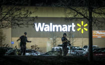 <p>Police investigate the scene of a shooting at a Wal Mart store in the Thorton Town Center shopping plaza on Nov. 1, 2017 in Thornton, Colo. (Photo: Marc Piscotty/Getty Images) </p>
