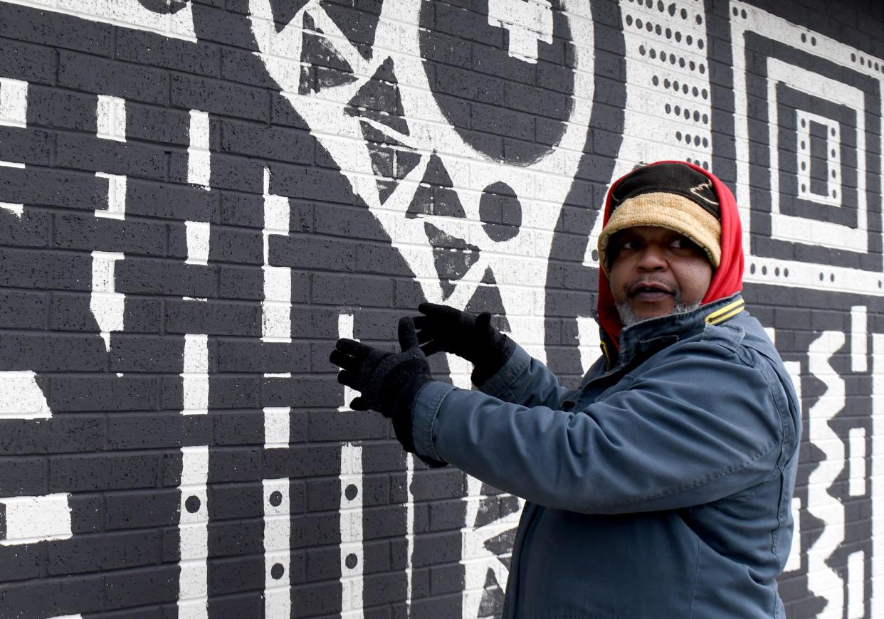 Errick Freeman said the hospitality mural he's creating on the exterior of the Shorb Neighborhood Market and Connection Center will include the word "welcome" in several languages.