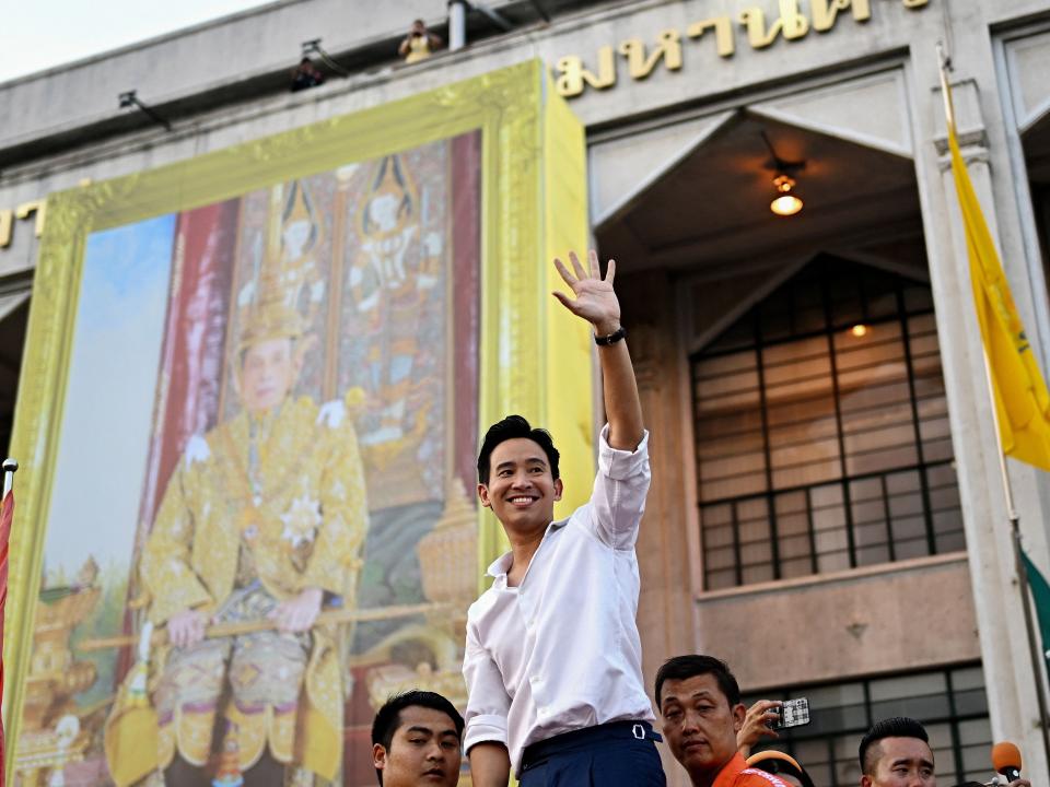 Pita Limjaroenrat waves to his supporters during a victory parade in Bangkok.