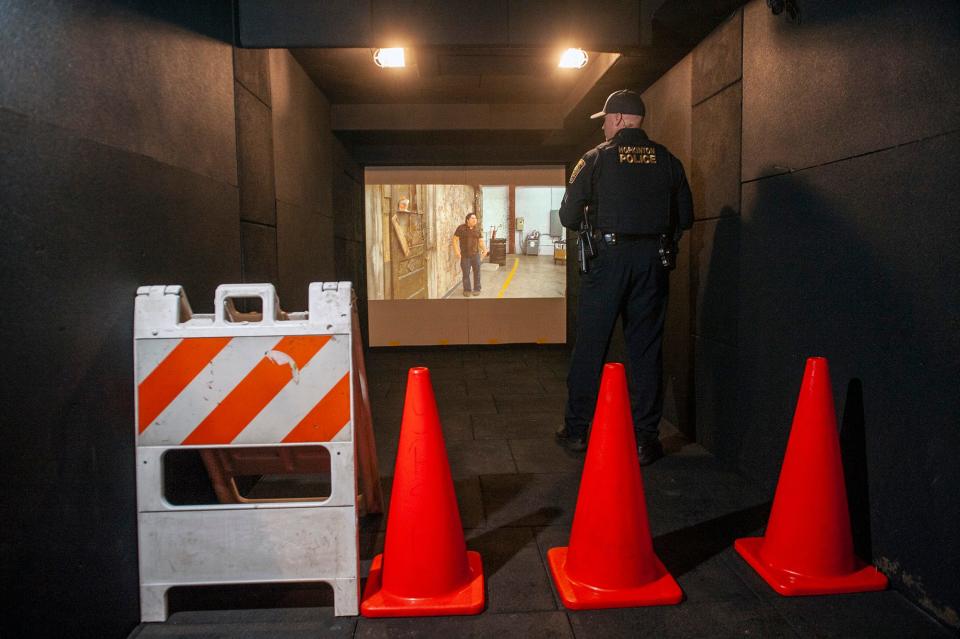 Hopkinton police Sgt. Matthew McNeil inside the Middlesex Sheriff Mobile Training Center, an interactive scenario-based training program, March 14, 2023.