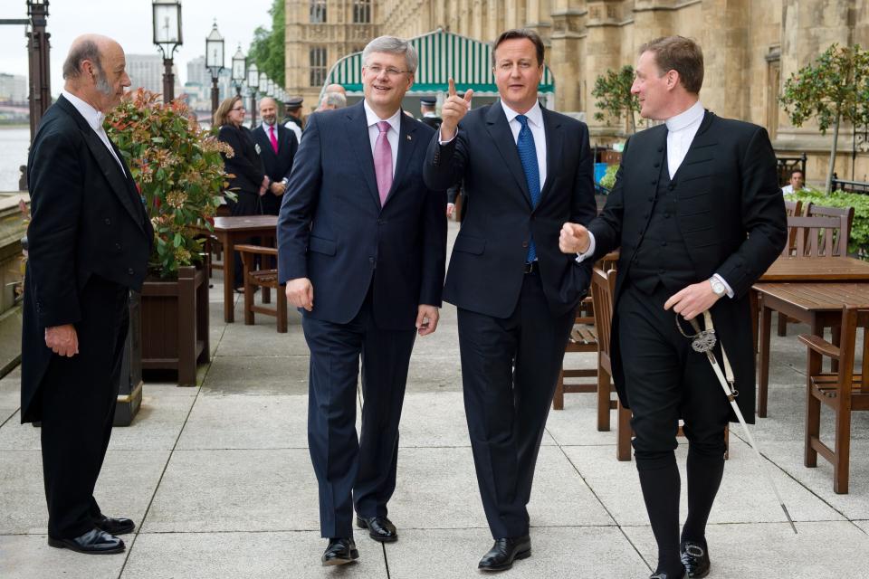 Prime Minister David Cameron talks with his Canadian counterpart Stephen Harper ahead of Mr Harper's address to the House of Commons in central London.