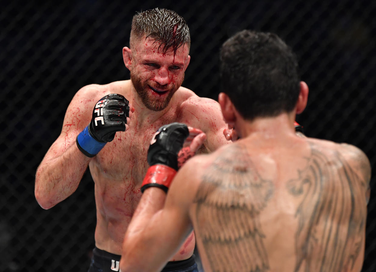 ABU DHABI, UNITED ARAB EMIRATES - JANUARY 17: (L-R) Calvin Kattar battles Max Holloway in a featherweight bout during the UFC Fight Night event at Etihad Arena on UFC Fight Island on January 17, 2021 in Abu Dhabi, United Arab Emirates. (Photo by Jeff Bottari/Zuffa LLC)