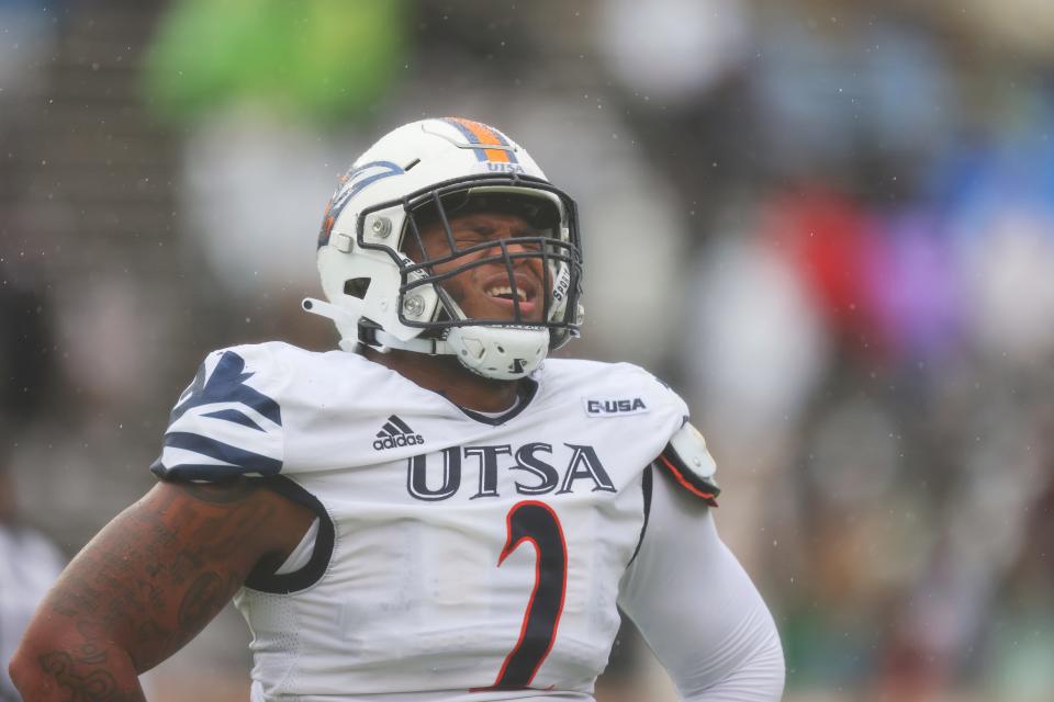 UTSA linebacker Charles Wiley reacts after a play during the first half of an NCAA college football game against North Texas in Denton, Texas, Saturday, Nov. 27, 2021. (AP Photo/Andy Jacobsohn)