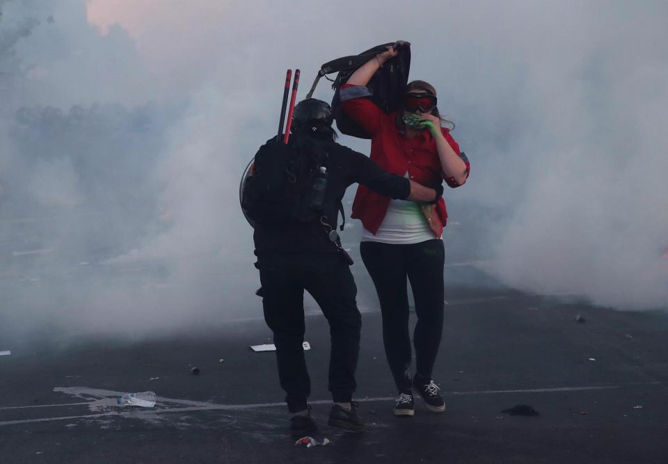 Numerous people were stuck by tear gas or non-lethal rounds fired by police: Getty