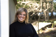 This Friday, Oct. 16, 2020, image provided Amanda Jaronowski shows her in Cleveland, Ohio. Jaronowski is part of a small but potentially significant group of voters who say they remain truly undecided less than three weeks before the November 3 election. (Joy Lewis Photography via AP)