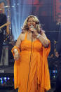 <p>Aretha Franklin wears an orange ruched halter sequin dress and bright blond hair during a performance on “The Tonight Show with Jay Leno.” (Photo by: Stacie McChesney/NBC/NBCU Photo Bank) </p>