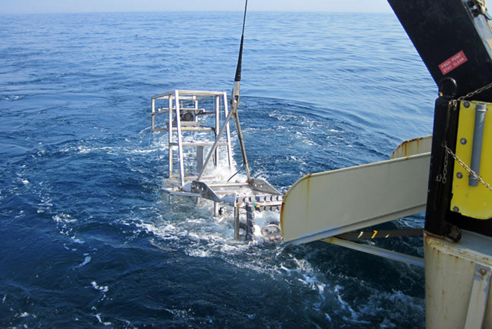 This June 2012 photo provided by the National Oceanic and Atmospheric Administration shows Seahorse, the latest and most sophisticated version of the marine habitat mapping camera system, HabCam, being recovered after a sea scallop survey off the Delaware coast. The apparatus was created to get better information about scallops, which bring fishermen a half-billion dollars in revenues annually. (AP Photo/NOAA)