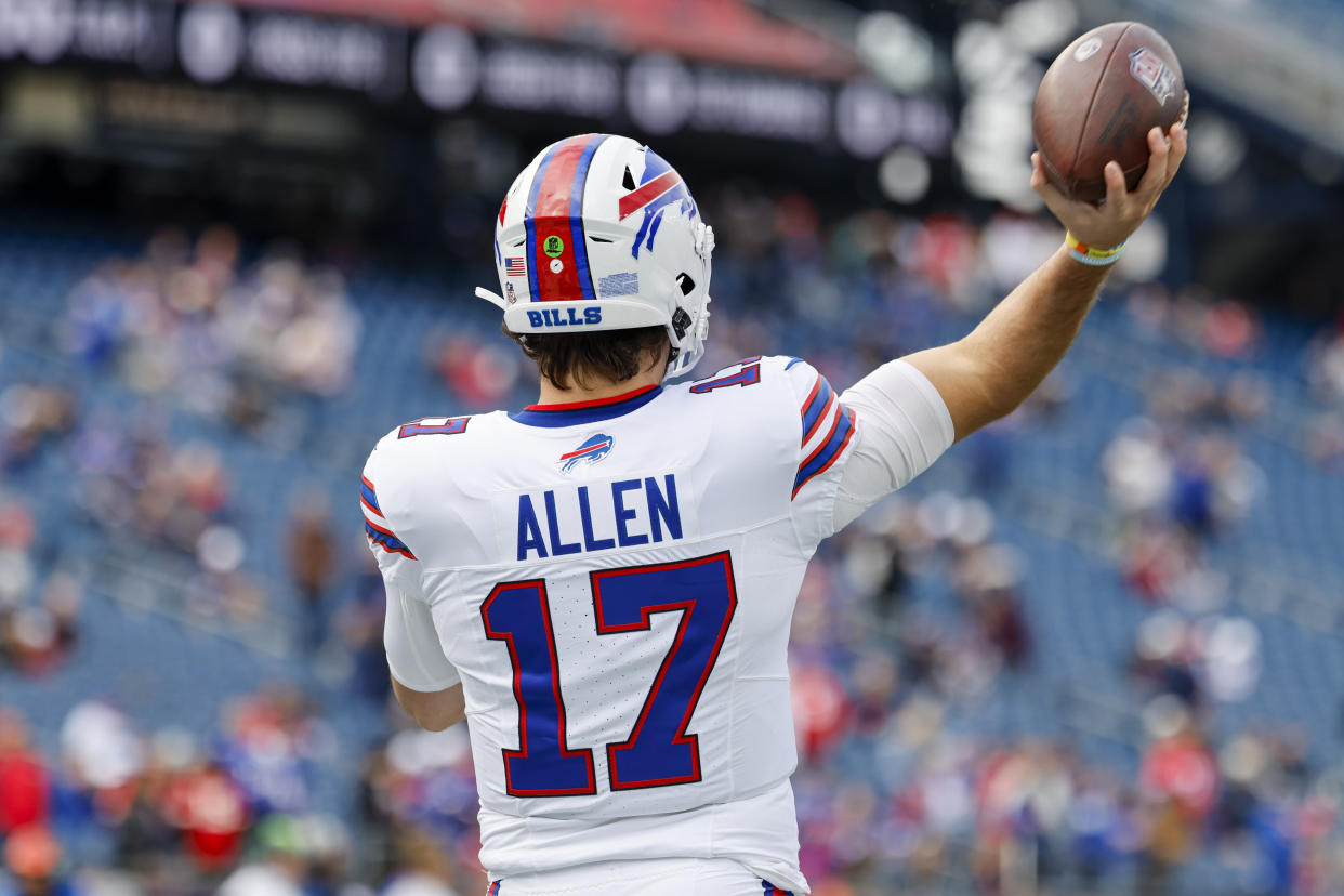 Buffalo Bills quarterback Josh Allen (17) makes a warm-up pass before an NFL football game against the New England Patriots on Sunday, Oct. 22, 2023, in Foxborough, Mass. (AP Photo/Greg M. Cooper)