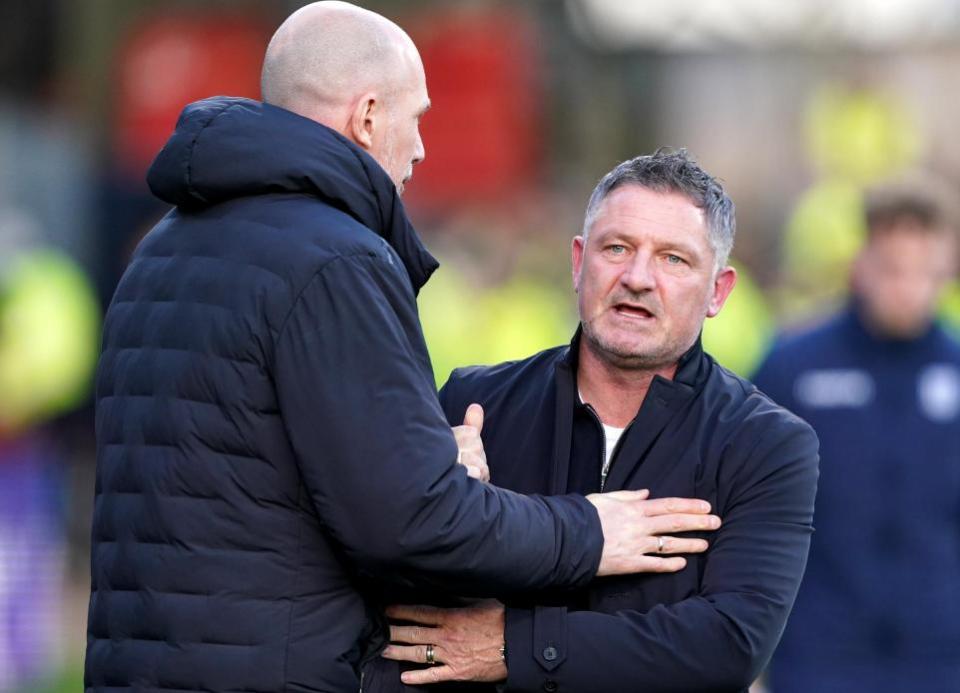 The Herald: Dundee manager Tony Docherty shakes hands with Philippe Clement at full-time