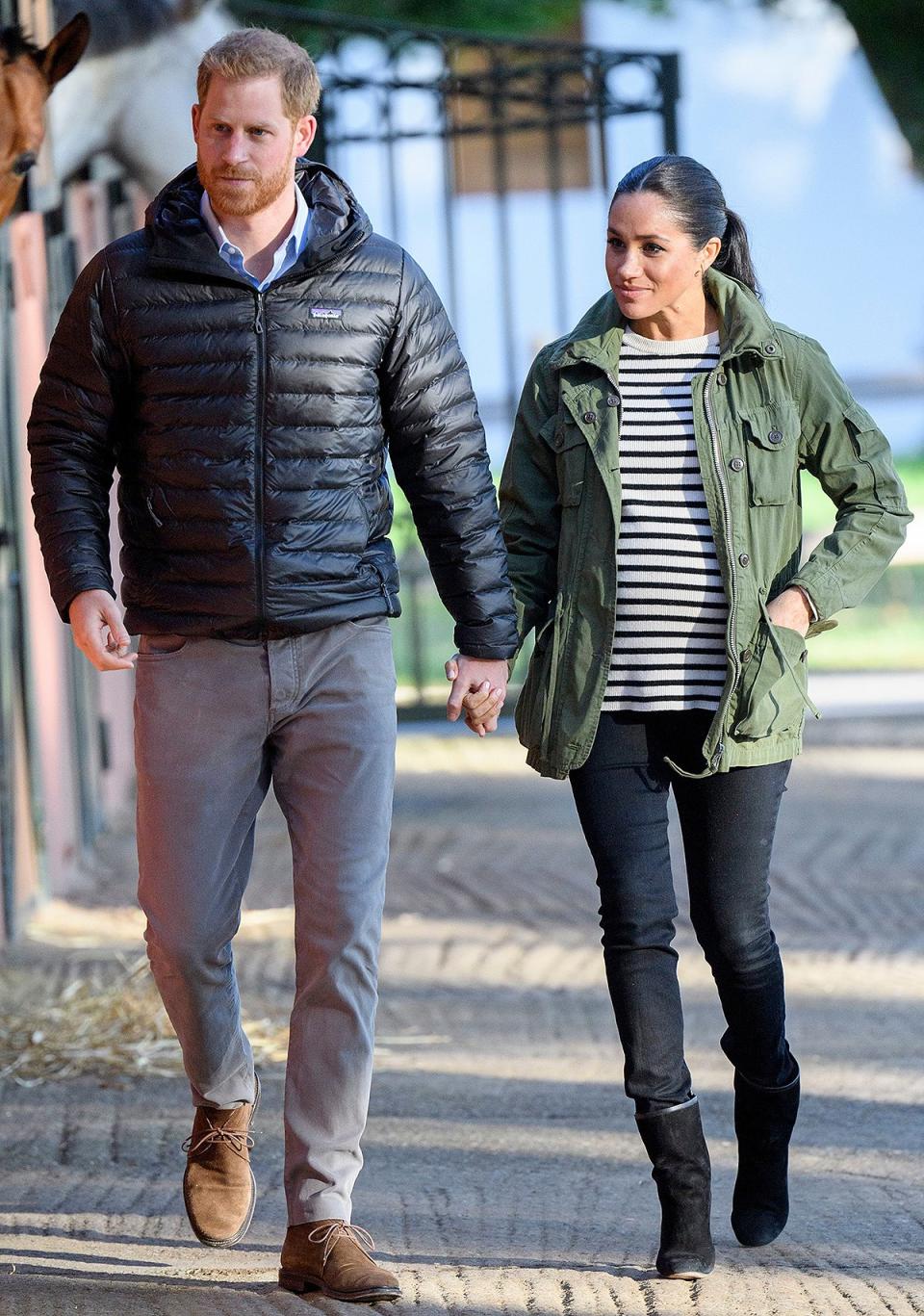 Meghan and Harry visited the Moroccan Royal Federation of Equestrian Sports to learn about the country’s program of supporting children with special needs through animal therapy. Meghan wore a <a href="https://people.com/royals/meghan-markle-rewears-jacket-pre-royalty-days/" rel="nofollow noopener" target="_blank" data-ylk="slk:recycled J.Crew anorak jacket;elm:context_link;itc:0;sec:content-canvas" class="link ">recycled J.Crew anorak jacket</a> over a striped sweater with black pants and <a href="http://www.anrdoezrs.net/links/8029122/type/dlg/sid/PEO,Shopping:EverythingYouNeedtoCopyMeghanMarkle'sChicSummerStyle,kamiphillips2,Unc,Gal,6939680,201909,I/https://www.stuartweitzman.com/womens-shoes/boots/" rel="nofollow noopener" target="_blank" data-ylk="slk:Stuart Weitzman;elm:context_link;itc:0;sec:content-canvas" class="link ">Stuart Weitzman</a> booties for a look that was equally cute and casual. <strong>Get the Look!</strong> Everlane The Modern Utility Jacket, $78; <a href="https://www.pjtra.com/t/8-9711-131940-104709?sid=PEO%2CShopping%3AEverythingYouNeedtoCopyMeghanMarkle%27sChicSummerStyle%2Ckamiphillips2%2CUnc%2CGal%2C6939680%2C201909%2CI&url=https%3A%2F%2Fwww.everlane.com%2Fproducts%2Fwomens-modern-utlty-jkt-surplus" rel="nofollow noopener" target="_blank" data-ylk="slk:everlane.com;elm:context_link;itc:0;sec:content-canvas" class="link ">everlane.com</a> Sanctuary Commodore Hooded Anorak, $169; <a href="https://click.linksynergy.com/deeplink?id=93xLBvPhAeE&mid=13867&murl=https%3A%2F%2Fwww.bloomingdales.com%2Fshop%2Fproduct%2Fsanctuary-commodore-hooded-anorak%3FID%3D3207506&u1=PEO%2CShopping%3AEverythingYouNeedtoCopyMeghanMarkle%27sChicSummerStyle%2Ckamiphillips2%2CUnc%2CGal%2C6939680%2C201909%2CI" rel="nofollow noopener" target="_blank" data-ylk="slk:bloomingdales.com;elm:context_link;itc:0;sec:content-canvas" class="link ">bloomingdales.com</a> DL1961 Women's Beekman Military Jacket, $168; <a href="https://www.amazon.com/DL1961-Womens-Beekman-Military-X-Small/dp/B077KHG14C?ie=UTF8&camp=1789&creative=9325&linkCode=as2&creativeASIN=B077KHG14C&tag=people0d0-20&ascsubtag=b06b2910c4a4ffe5601df74971d5b856" rel="nofollow noopener" target="_blank" data-ylk="slk:amazon.com;elm:context_link;itc:0;sec:content-canvas" class="link ">amazon.com</a> Cupcakes and Cashmere Wynona Jacket, $148; <a href="http://www.anrdoezrs.net/links/8029122/type/dlg/sid/PEO,Shopping:EverythingYouNeedtoCopyMeghanMarkle'sChicSummerStyle,kamiphillips2,Unc,Gal,6939680,201909,I/https://www.revolve.com/cupcakes-and-cashmere-wynona-jacket/dp/CUPR-WO68/" rel="nofollow noopener" target="_blank" data-ylk="slk:revolve.com;elm:context_link;itc:0;sec:content-canvas" class="link ">revolve.com</a> Halogen Slit Sleeve Sweater, $49; <a href="https://click.linksynergy.com/deeplink?id=93xLBvPhAeE&mid=1237&murl=https%3A%2F%2Fshop.nordstrom.com%2Fs%2Fhalogen-slit-sleeve-sweater-regular-petite%2F4958102&u1=PEO%2CShopping%3AEverythingYouNeedtoCopyMeghanMarkle%27sChicSummerStyle%2Ckamiphillips2%2CUnc%2CGal%2C6939680%2C201909%2CI" rel="nofollow noopener" target="_blank" data-ylk="slk:nordstrom.com;elm:context_link;itc:0;sec:content-canvas" class="link ">nordstrom.com</a> Eileen Fisher Striped Sweater, $166.60 (orig. $238); <a href="https://click.linksynergy.com/deeplink?id=93xLBvPhAeE&mid=13867&murl=https%3A%2F%2Fwww.bloomingdales.com%2Fshop%2Fproduct%2Feileen-fisher-striped-sweater%3FID%3D3308834&u1=PEO%2CShopping%3AEverythingYouNeedtoCopyMeghanMarkle%27sChicSummerStyle%2Ckamiphillips2%2CUnc%2CGal%2C6939680%2C201909%2CI" rel="nofollow noopener" target="_blank" data-ylk="slk:bloomingdales.com;elm:context_link;itc:0;sec:content-canvas" class="link ">bloomingdales.com</a> Theory Striped Boatneck Sweater, $248.50 with code GOBIG19 (orig. $355); <a href="https://click.linksynergy.com/deeplink?id=93xLBvPhAeE&mid=42352&murl=https%3A%2F%2Fwww.shopbop.com%2Fstriped-boatneck-sweater-theory%2Fvp%2Fv%3D1%2F1577630682.htm&u1=PEO%2CShopping%3AEverythingYouNeedtoCopyMeghanMarkle%27sChicSummerStyle%2Ckamiphillips2%2CUnc%2CGal%2C6939680%2C201909%2CI" rel="nofollow noopener" target="_blank" data-ylk="slk:shopbop.com;elm:context_link;itc:0;sec:content-canvas" class="link ">shopbop.com</a>