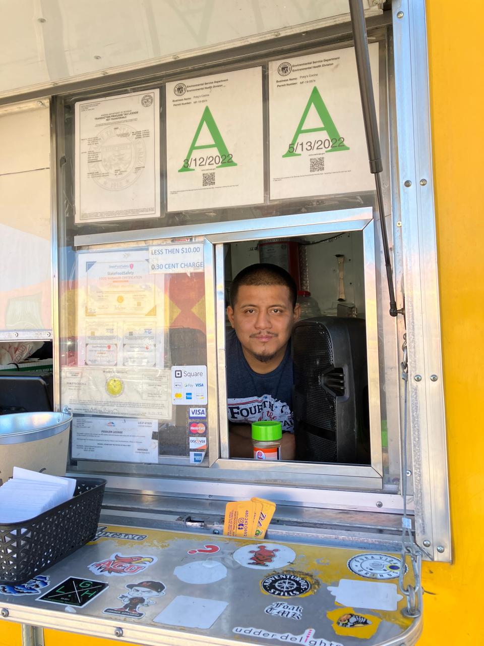 Tomas Martin was giving away free tacos to voters outside the Guadalupe Mercado polling place on Nov. 8, 2022.