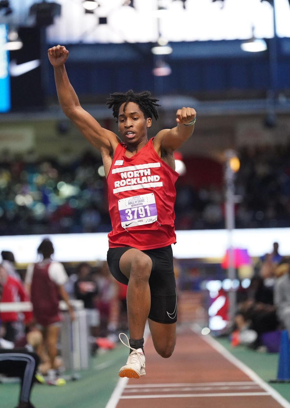 North Rockland's Shamell Roberts competes in the triple-jump at The JAMBAR Coaches Hall of Fame Invitational at Armory Track & Field Center in New York on Saturday, Dec 16, 2023.