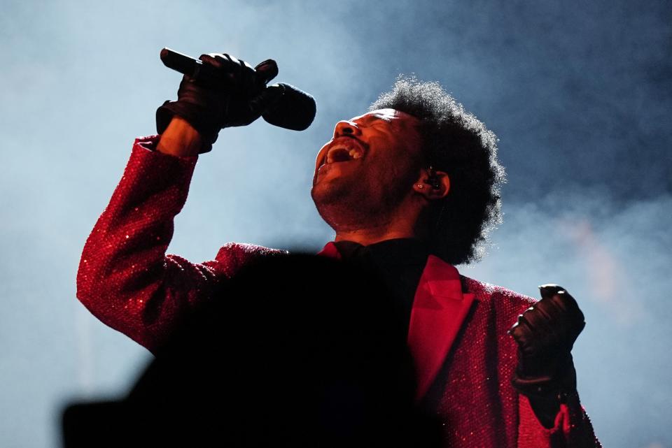 The Weeknd performs during the halftime show of the NFL Super Bowl 55 football game between the Kansas City Chiefs and Tampa Bay Buccaneers, Sunday, Feb. 7, 2021, in Tampa, Fla. (AP Photo/David J. Phillip)