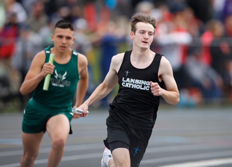 Lansing Catholic runs in the 4x800 relay, Saturday, June 4, 2022, at Kent City High School.