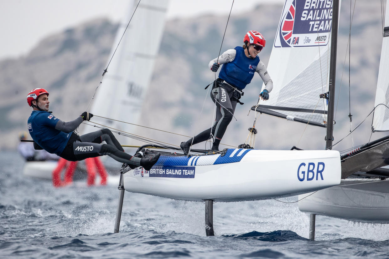 Anna Burnet (right) will have a second shot at Olympic gold after taking silver at Tokyo 2020 alongside John Gimson (left) in the Nacra 17 class (Image: Royal Yachting Association/Sander van der Borch/World Sailing)