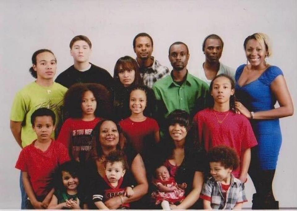 Romeo Xavier Portillo with his 11 siblings, mother and family members.