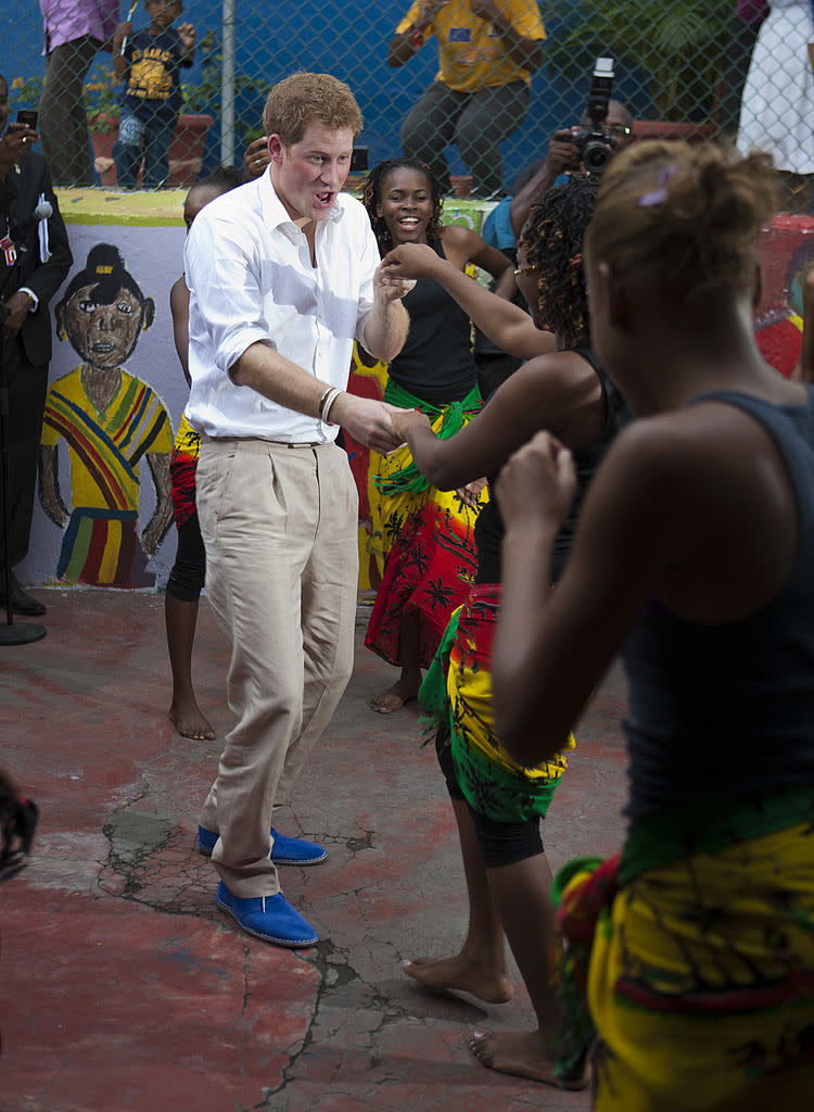 Prince Harry became an unofficial ambassador for Russell and Bromley during the Diamond Jubilee Tour [Photo: Getty]