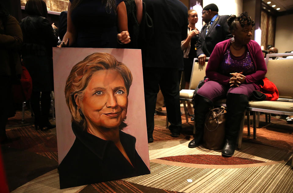 <p>An attendee holds a painting of Hillary Clinton during the National Action Network’s 25th Anniversary Convention in New York City, April 13, 2016. (Justin Sullivan/Getty Images) </p>