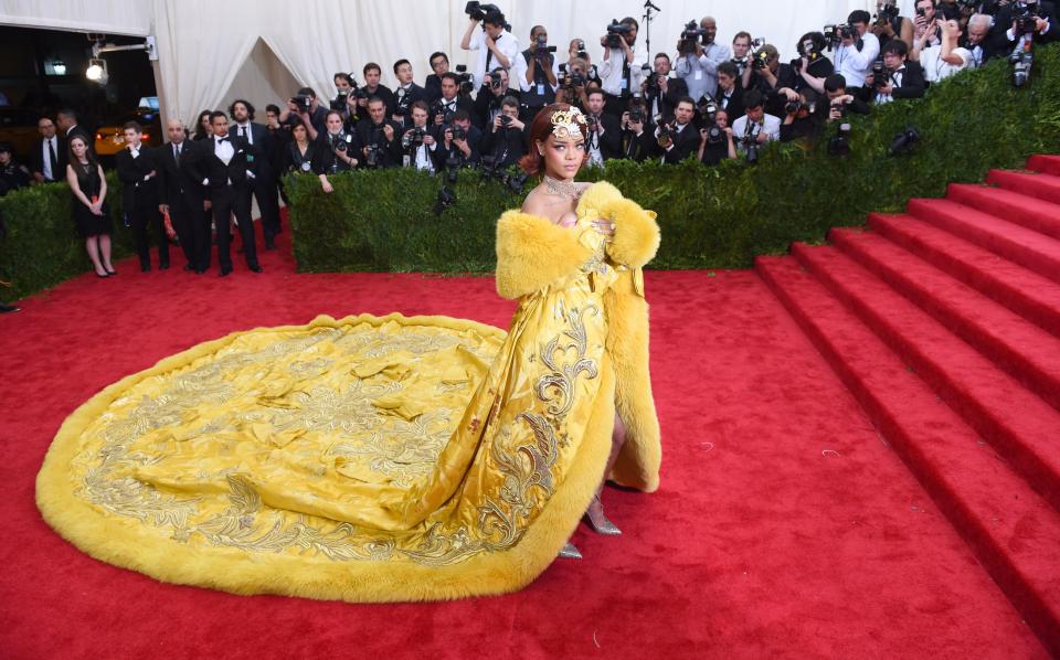 Rihanna arrives at the 2015 Metropolitan Museum of Art's Costume Institute Gala benefit in honor of the museums latest exhibit China: Through the Looking Glass May 4, 2015 in New York. AFP PHOTO / TIMOTHY A. CLARY (Photo credit should read TIMOTHY A. CLARY/AFP via Getty Images)