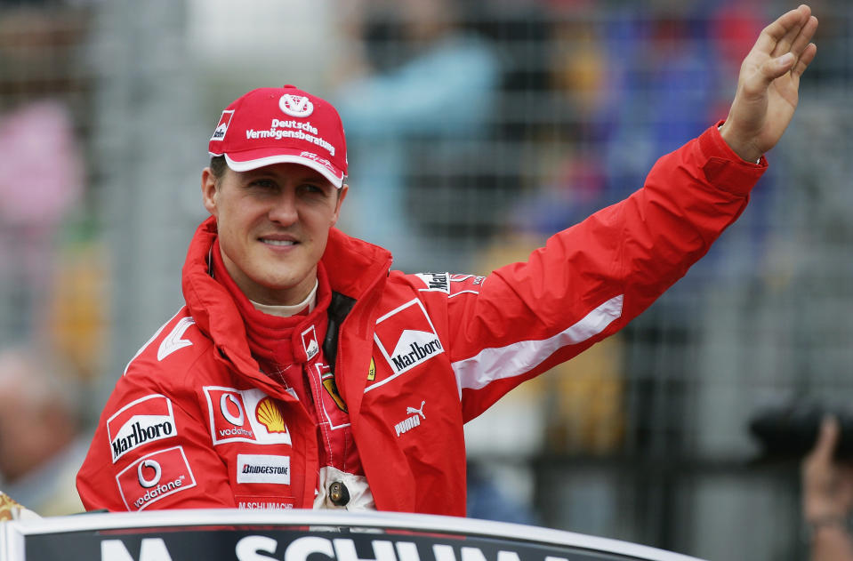 MELBOURNE, AUSTRALIA - MARCH 6:  Michael Schumacher of Germany and Ferrari during the drivers parade prior to the Australian Formula One Grand Prix at Albert Park on March 6, 2005 in Melbourne, Australia. (Photo by Clive Mason/Getty Images)  