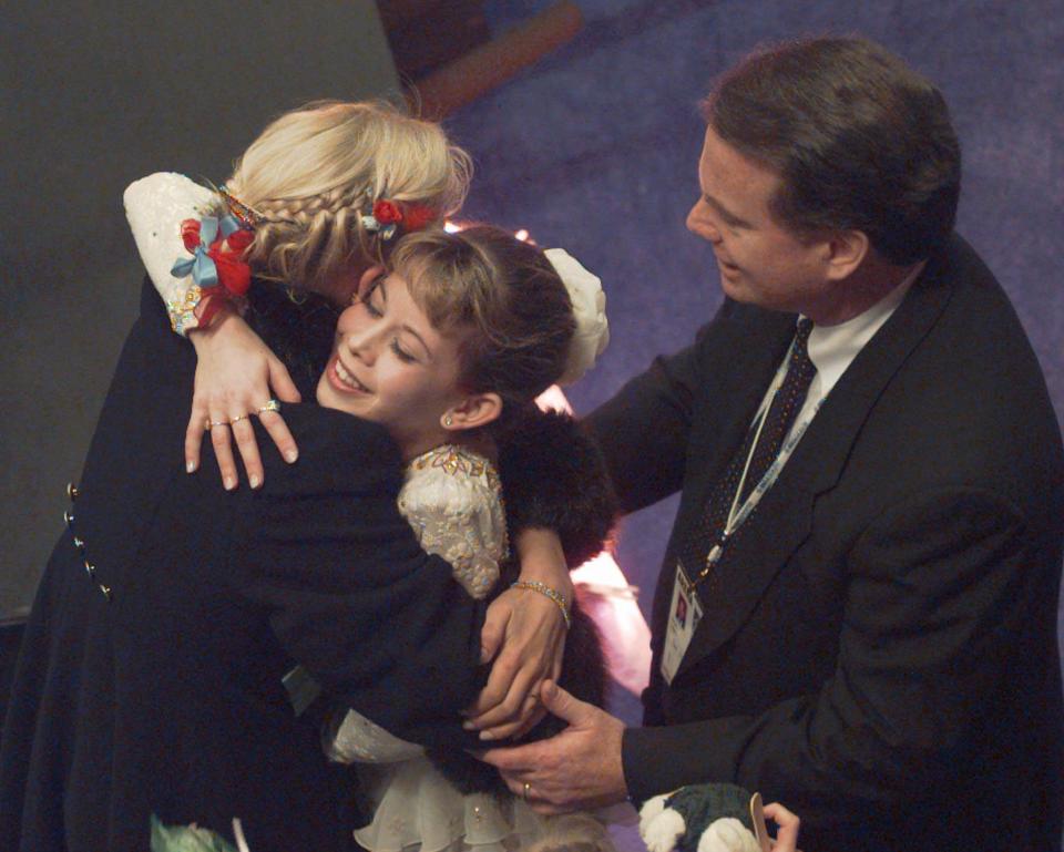 Richard Callaghan (right) coached Tara Lipinski to a gold medal at the 1998 Nagano Olympics. (AP)