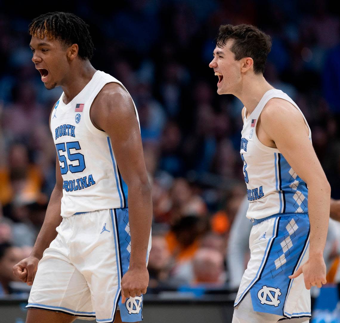 North Carolina’s Harrison Ingram (55) and Cormac Ryan (3) react after Ingram sank a three-point basket to secure a 69-57 lead over Michigan State in the second half on Saturday, March 23, 2024 in the second round of the NCAA Tournament at Spectrum Center in Charlotte, N.C.