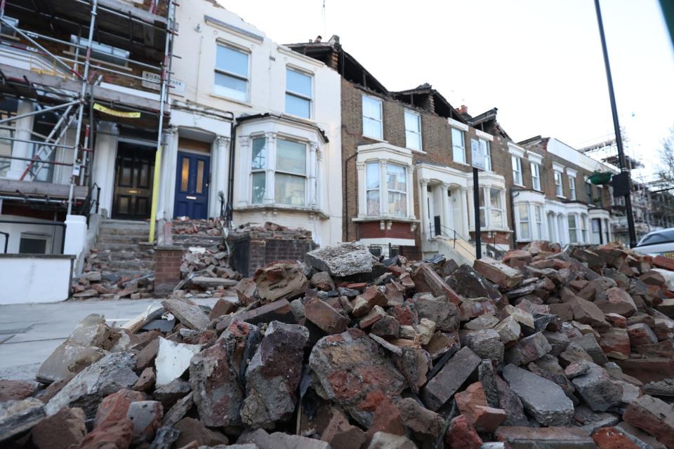 Roadside filled with debris in north-west London (PA)