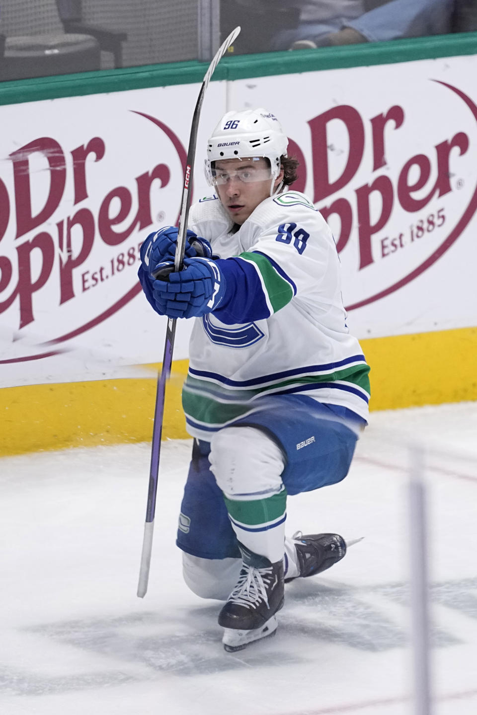 Vancouver Canucks left wing Andrei Kuzmenko celebrates after scoring in overtime of an NHL hockey game against the Dallas Stars, Monday, Feb. 27, 2023, in Dallas. (AP Photo/Tony Gutierrez)