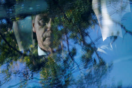 Brazil's President-elect Jair Bolsonaro leaves the Granja do Torto official residence after a meeting in Brasilia, Brazil, December 19, 2018. REUTERS/Adriano Machado