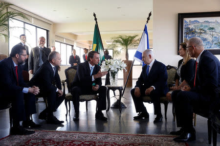 Brazil's President-elect Jair Bolsonaro talks with Israeli Prime Minister Benjamin Netanyahu during a meeting in Rio de Janeiro, Brazil December 28, 2018. Fernando Frazao/Courtesy of Agencia Brasil/Handout via REUTERS
