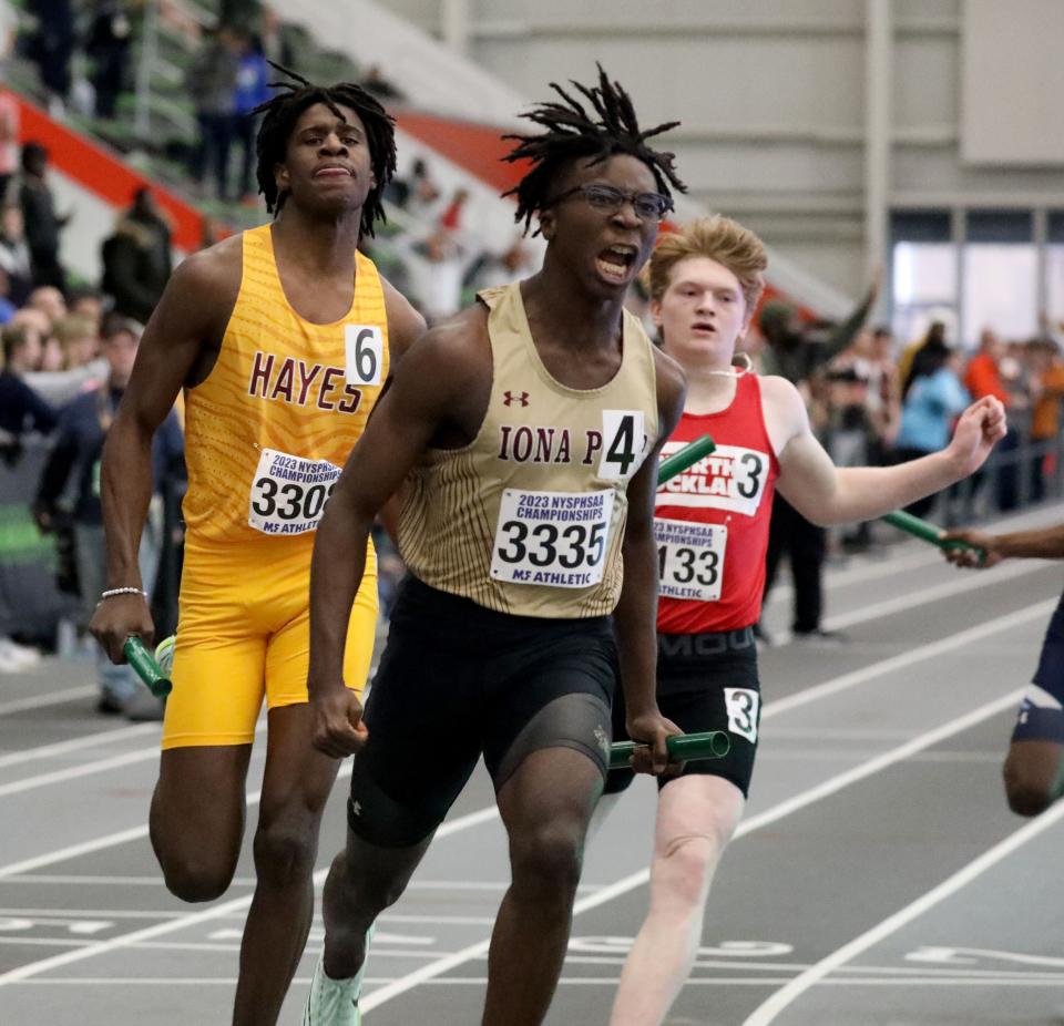 Marcus Nahim from Iona Prep lets out a scream as his team wins the final of the boys 4x200 meter relay during the New York State Indoor Track and Field Championships, at the Ocean Breeze Athletic Complex on Staten Island, March 4, 2023. 