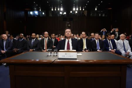 Former FBI Director James Comey testifies before a Senate Intelligence Committee hearing on Russia's alleged interference in the 2016 U.S. presidential election on Capitol Hill in Washington, U.S., June 8, 2017. REUTERS/Jonathan Ernst