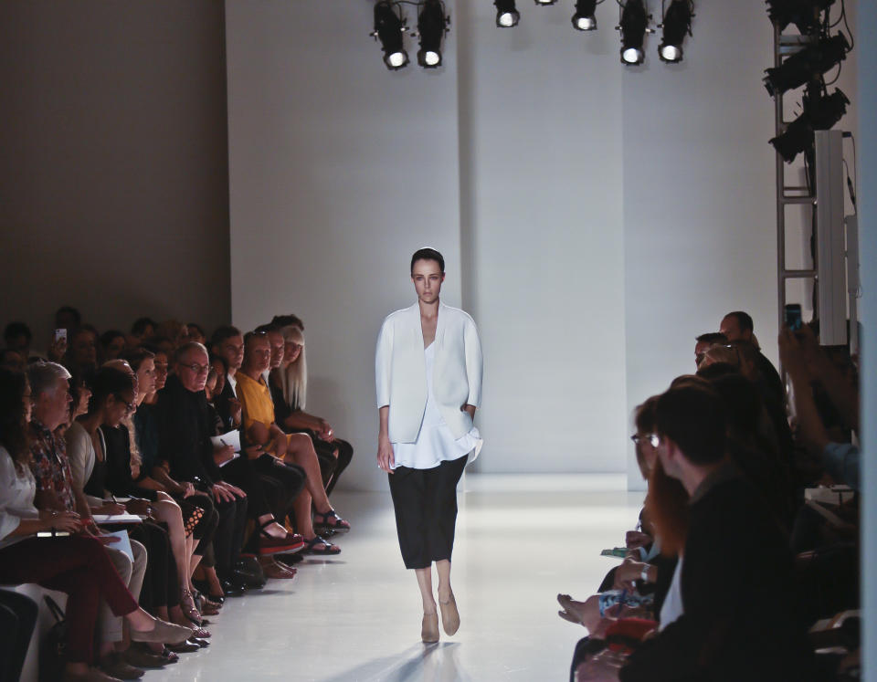 Fashion from the Spring 2014 collection of Victoria Beckham is modeled on Sunday, Sept. 8, 2013 in New York. (AP Photo/Bebeto Matthews)