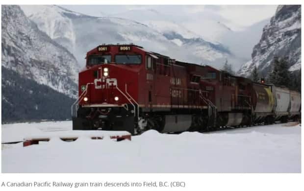 A Canadian Pacific Railway grain train descends into Field, B.C. Two families are suing the company, its police service and Transport Canada, among others, after three crew members were killed in a train derailment aboard CP Train 301 in February 2019.