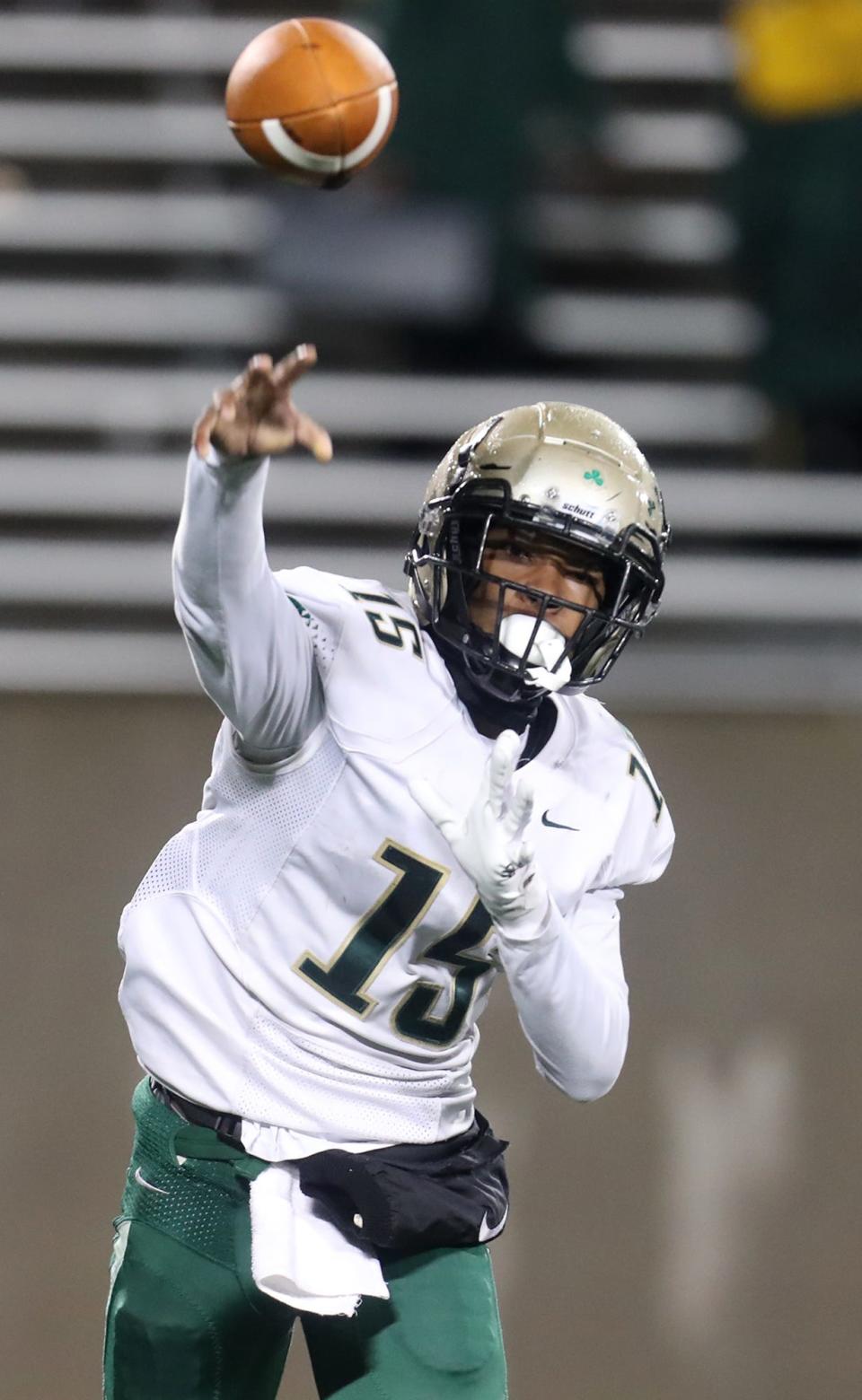 St. Vincent-St Mary quarterback Markelle Carter attempts a pass against Archbishop Hoban during a Division II regional semifinal in 2022 at the University of Akron's InfoCision Stadium.