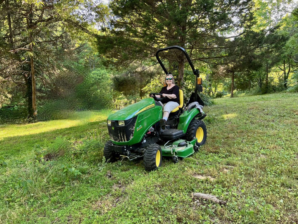 Sydney Broach said her biggest disappointment prior to surgery was not being able to be active with her grandkids or work outside on her farm. Broach is pictured sitting on her brand new tractor after her successful hip replacement performed by Dr. Cory Calendine at Williamson Medical Center.