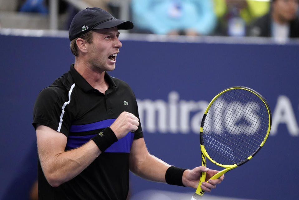 Botic Van de Zandschulp, of the Netherlands, reacts after defeating Diego Schwartzman, of Argentina, during the fourth round of the US Open tennis championships, Sunday, Sept. 5, 2021, in New York. (AP Photo/John Minchillo)