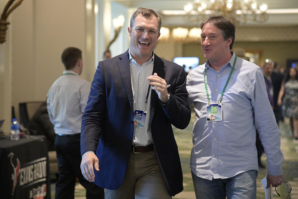 San Francisco 49ers general manager John Lynch, left, chats with Don Banks while walking to a conference room during the NFL owners meetings, Monday, March 26, 2018 in Orlando, Fla. (Phelan M. Ebenhack/AP Images for NFL)