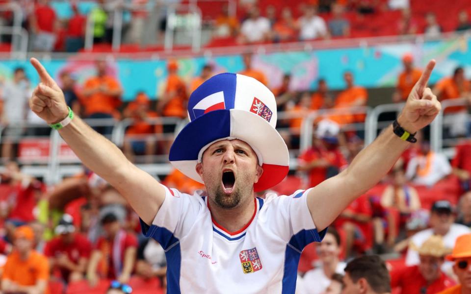 A Czech fan in the stands at the Puskas Arena - AFP