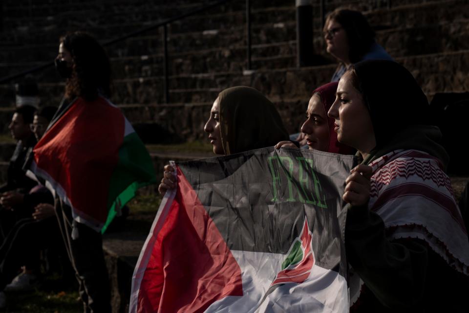 Mar 8, 2024; Montclair, NJ, United States; People hold Palestinian flags as New Jersey Students for Justice in Palestine hold a protest at Montclair State University after administrators withdrew approval for a fundraiser called "Palestine Lives." The fundraiser for humanitarian relief in Gaza was canceled the day before the event amid heightened scrutiny of pro-Palestinian activism on campus.