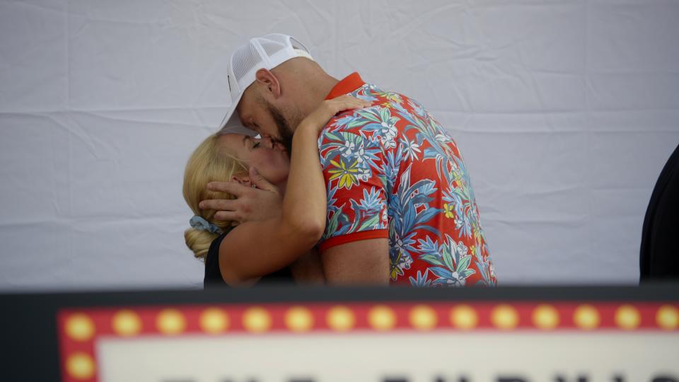 Tyson Fury kissing his wife Paris.