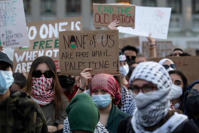 Young man with Palestinian keffiyeh feeling inner world, Stock