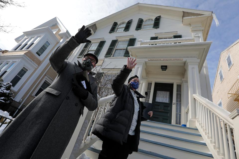 British Consul General in Boston, Dr. Peter Abbott OBE, and Lee Blake, president of the New Bedford Historical Society, wave to a passing car, before making their way into the Nathan & Polly Johnson House.
(Credit: PETER PEREIRA/The Standard-Times/FILE)
