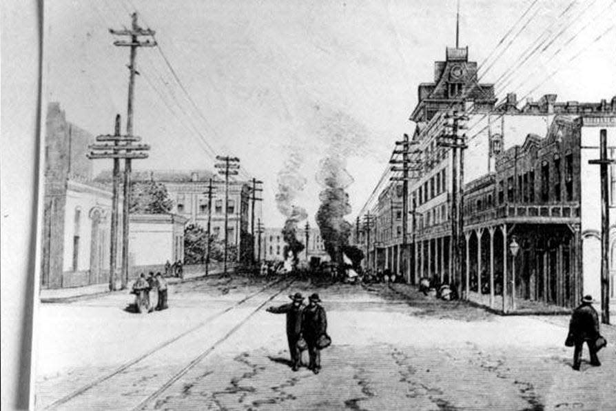 Fires burned across Jacksonville as residents lit bonfires of pine and tar in an attempt to disinfect the air during the 1888 yellow fever epidemic.