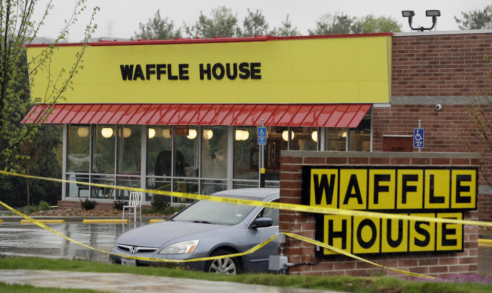 <p>Police tape blocks off a Waffle House restaurant Sunday, April 22, 2018, in Nashville, Tenn. (Photo: Mark Humphrey/AP) </p>