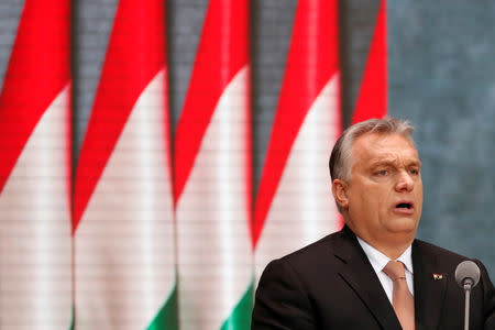 FILE PHOTO: Hungarian Prime Minister Viktor Orban delivers a speech during the celebrations of the 62nd anniversary of the Hungarian Uprising of 1956, in Budapest, Hungary, October 23, 2018. REUTERS/Bernadett Szabo/File Photo