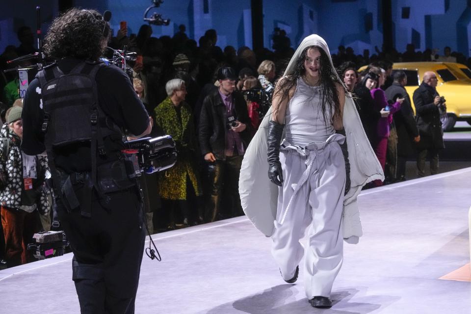 Singer Rosalia leaves after the conclusion of the Louis Vuitton menswear Fall-Winter 2023-24 collection presented in Paris, Thursday, Jan. 19, 2023. (AP Photo/Thibault Camus)