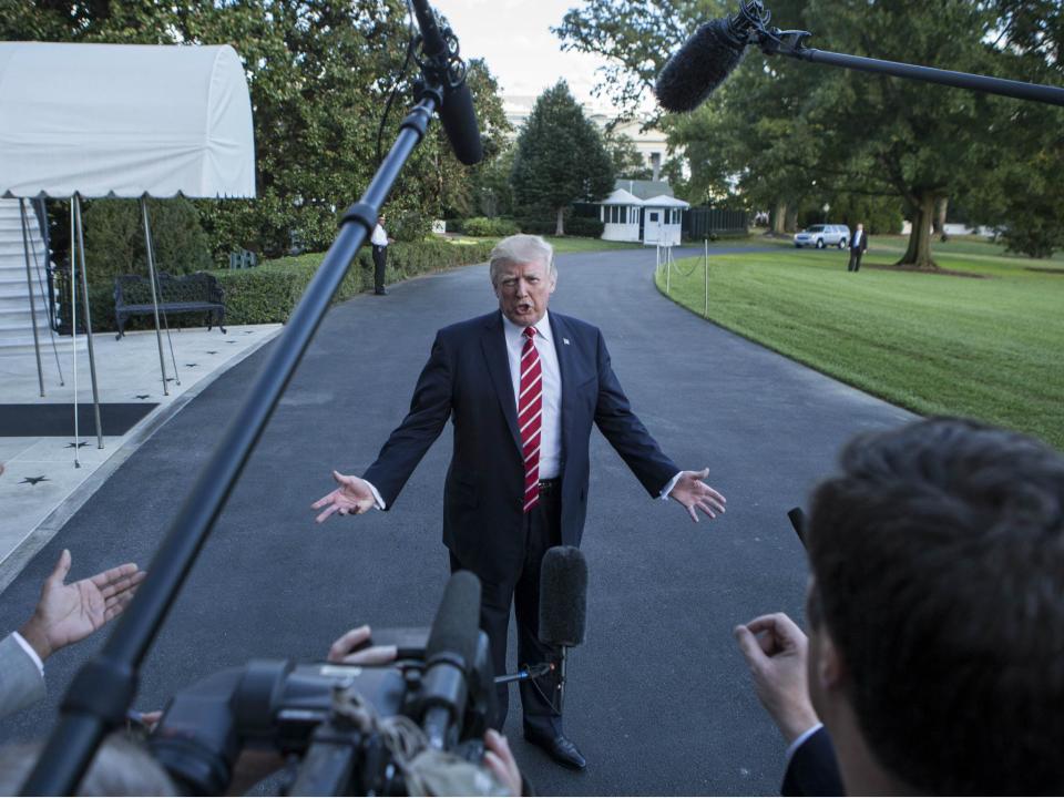 Donald Trump speaks to reporters outside the White House: ALEX EDELMAN/AFP/Getty Images